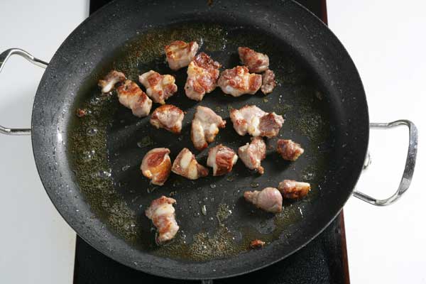 paso 2 receta ingrediente 460g de costilla de cerdo, aceite de oliva